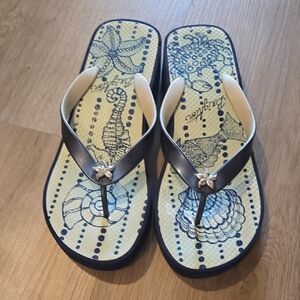 Elegant Brighton Navy Flip-Flops with Silver Accent